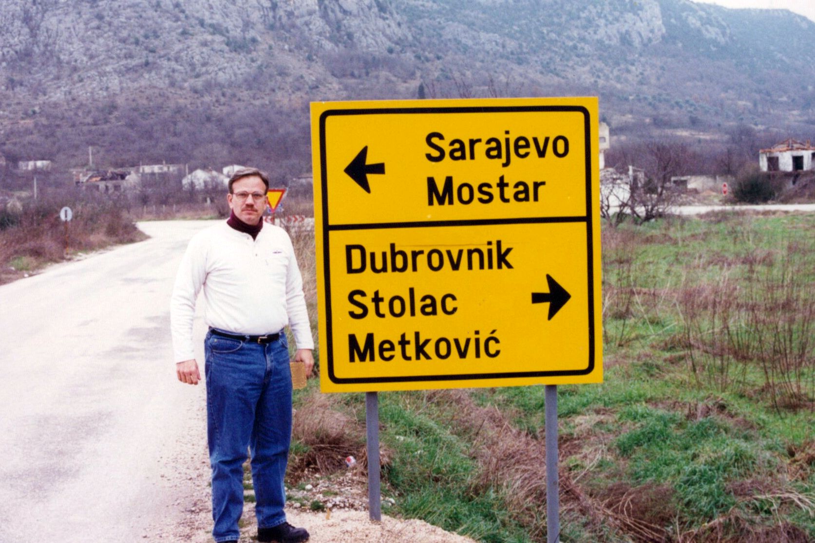 RP at sign Bosnia En Route to Bosnia